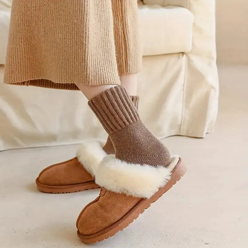 On the floor, in a slipper