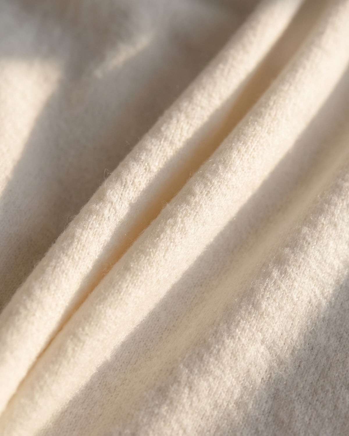 Close up of the brushed knit and its soft nap