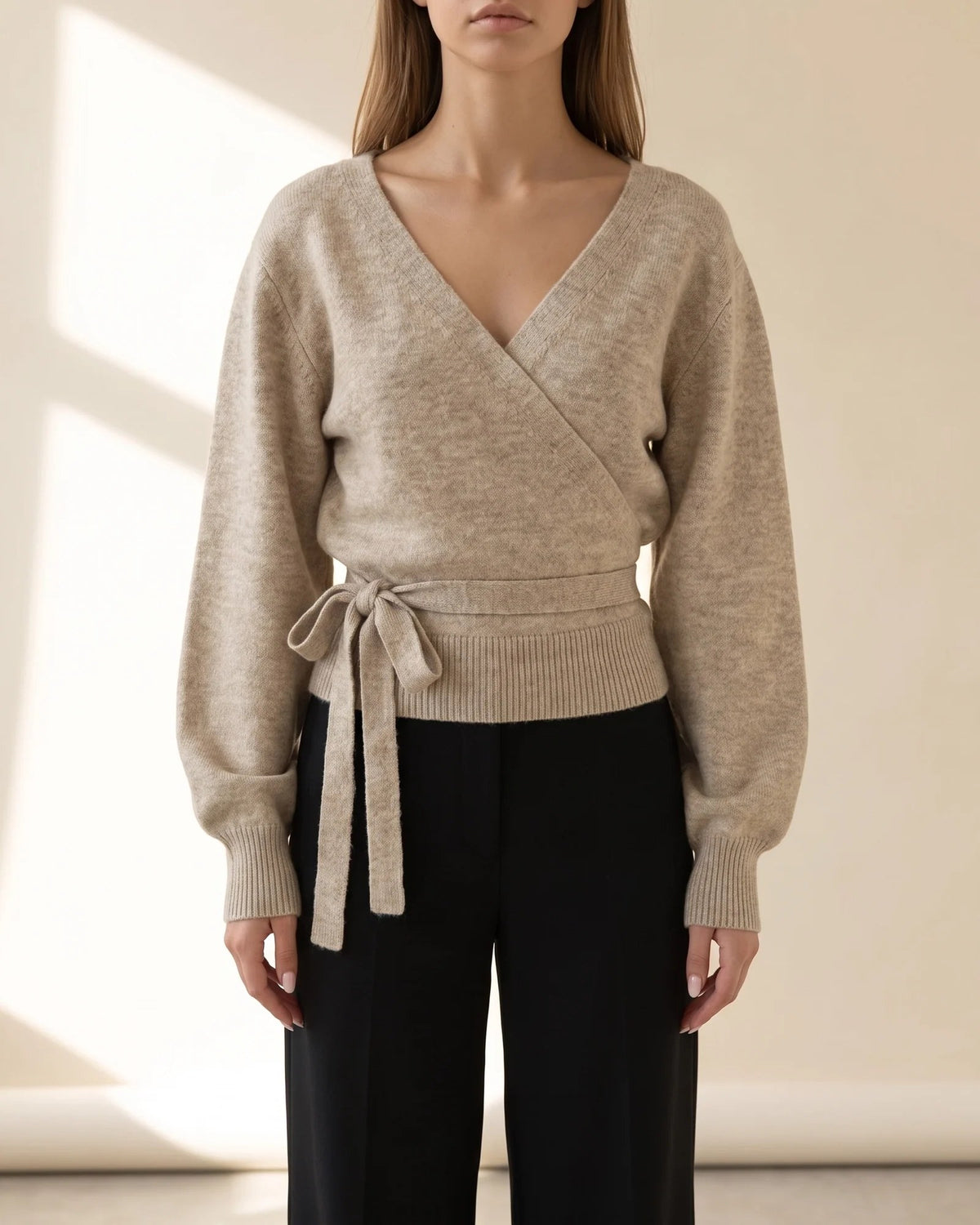 The Juliette Wrap Sweater in oatmeal, deep V wrap front and side tie bow