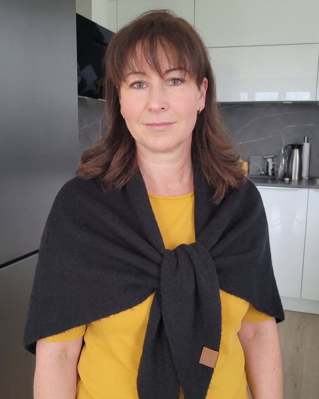 Black Fleece Shawl knotted at the chest