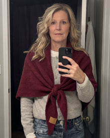 Red Fleece Shawl knotted at the chest, worn