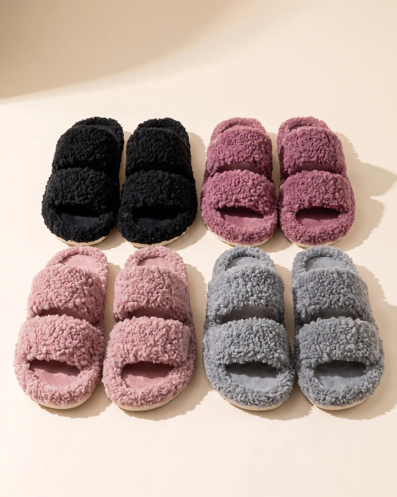Close view of the curly teddy fur straps and microsuede footbed